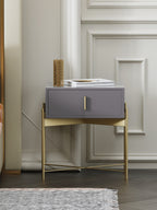 Upholstered Nightstand with Metal Accents